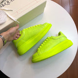 Alexander McQueen two-tone luxury sneakers view 4 signature lace-up style