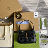 Side profile of elevated premium women's handbag – women's luxury accessory