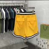 Side profile of Rhude luxury clothing with streetwear-inspired cut