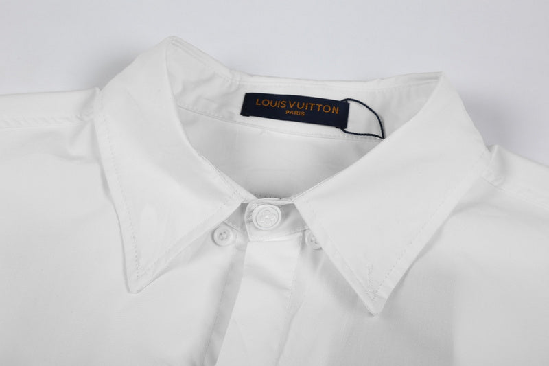 Close-up detail shot of Louis Vuitton luxury clothing with monogram-inspired silhouette
