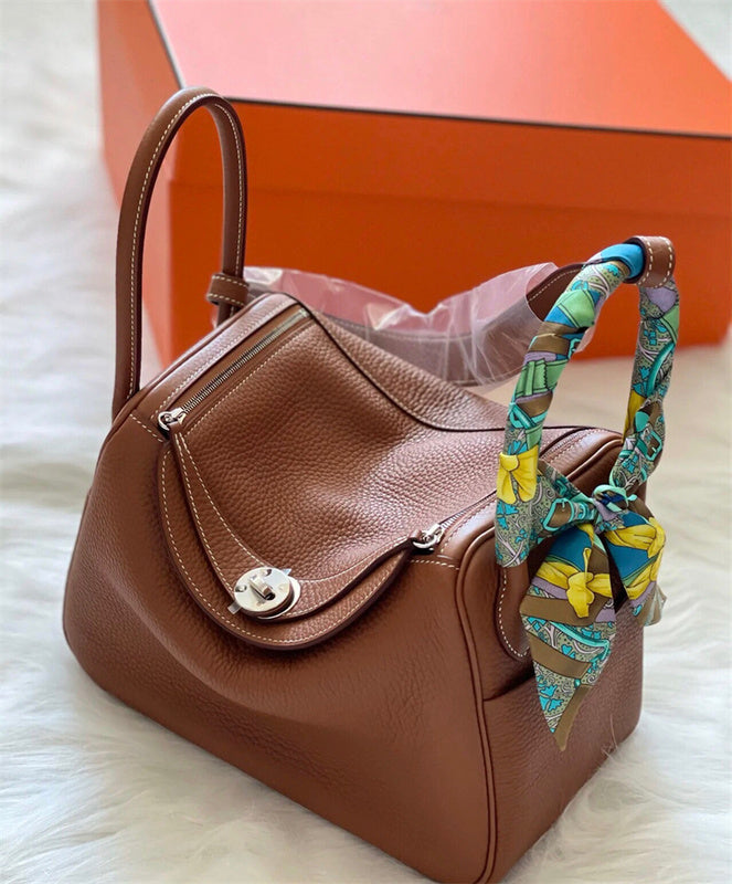  Chic structured bag carried on shoulder