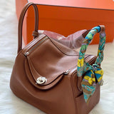  Chic structured bag carried on shoulder