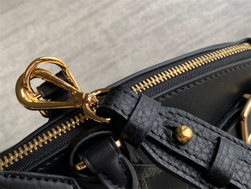  Polished top-handle bag carried on shoulder