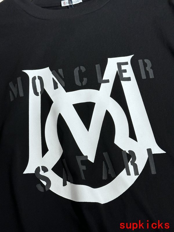 Close-up detail shot of Moncler luxury clothing with monogram-inspired silhouette