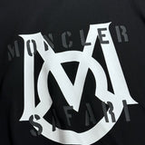 Close-up detail shot of Moncler luxury clothing with monogram-inspired silhouette