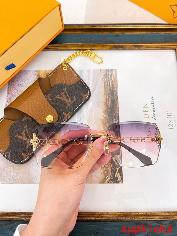 Close-up detail view of Louis Vuitton unisex sunglasses