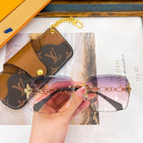 Close-up detail view of Louis Vuitton unisex sunglasses