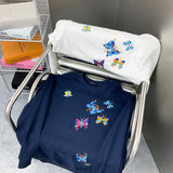 Back view of Louis Vuitton luxury clothing with label-forward styling