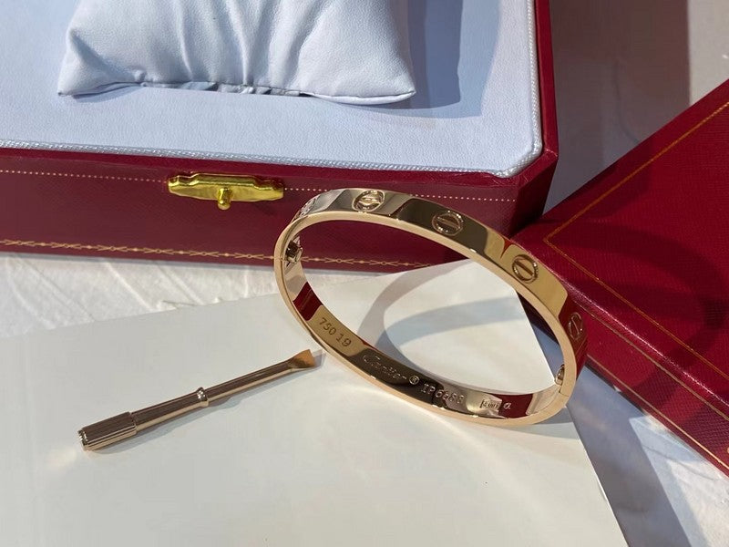Side view of Cartier unisex jewelry piece