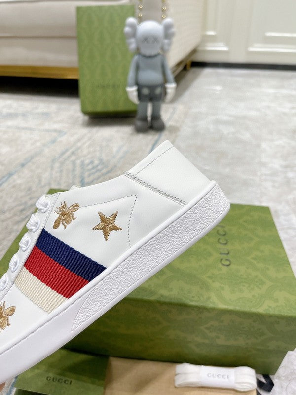 Side profile of Gucci tonal black sneakers classic court silhouette
