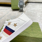Side profile of Gucci tonal black sneakers classic court silhouette