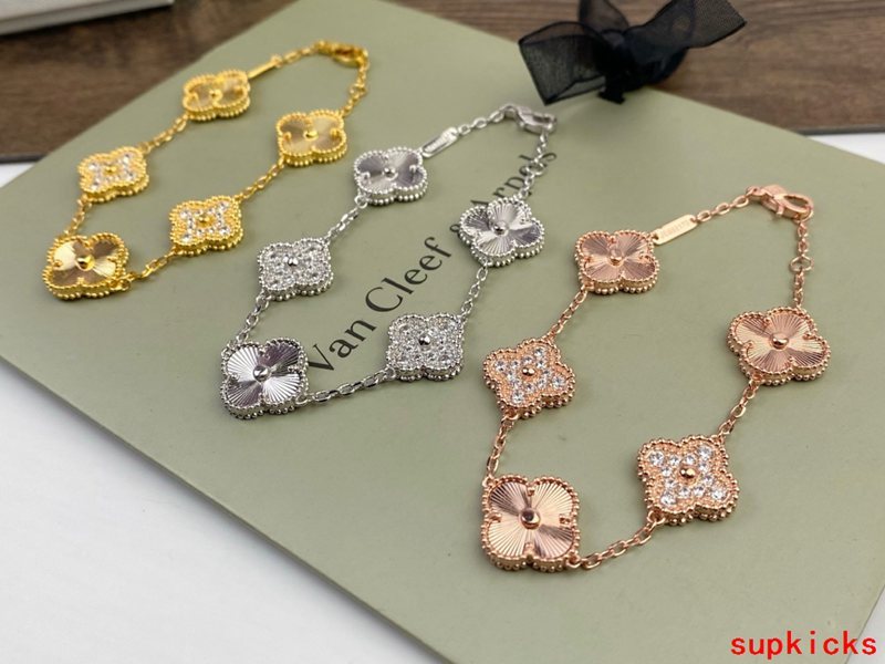 Lifestyle view of Van Cleef & Arpels unisex jewelry piece
