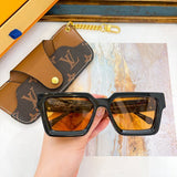 Angled view of Louis Vuitton unisex sunglasses