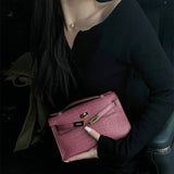 Side view of effortless structured handbag
