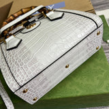 Styled lifestyle shot of classic refined women's handbag – women's statement bag
