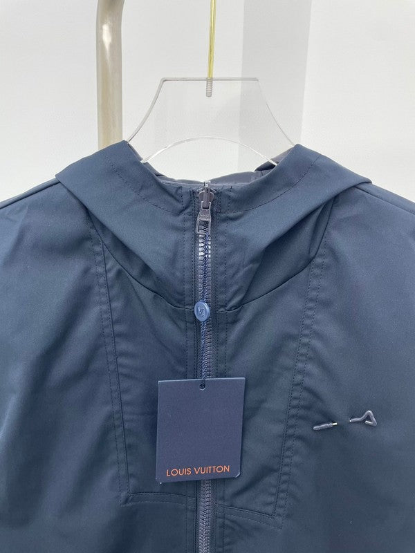 Side profile of Louis Vuitton luxury clothing with tailored silhouette
