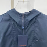 Side profile of Louis Vuitton luxury clothing with tailored silhouette