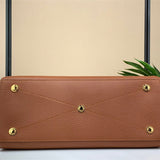  Clean-Lined shoulder bag carried on shoulder