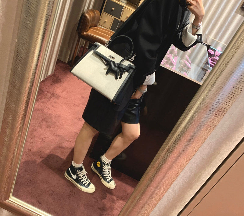 Side view of crisp structured handbag