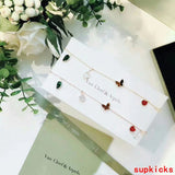 Lifestyle view of Van Cleef & Arpels unisex jewelry piece