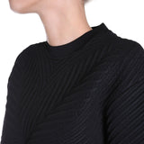 Close-up of Alexander McQueen sweaters & pullovers hardware and fine stitching
