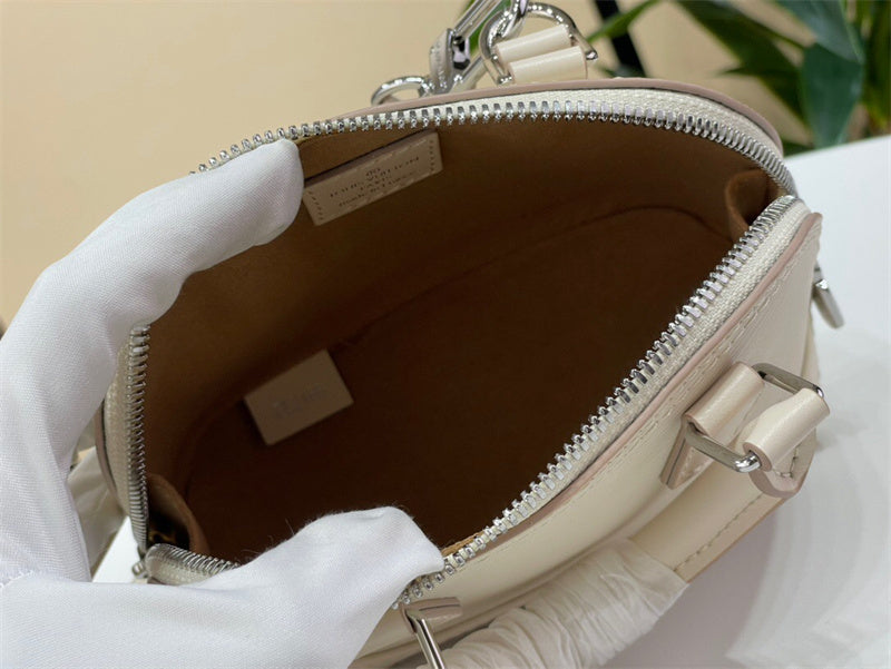  sophisticated top-handle bag styled with outfit 24