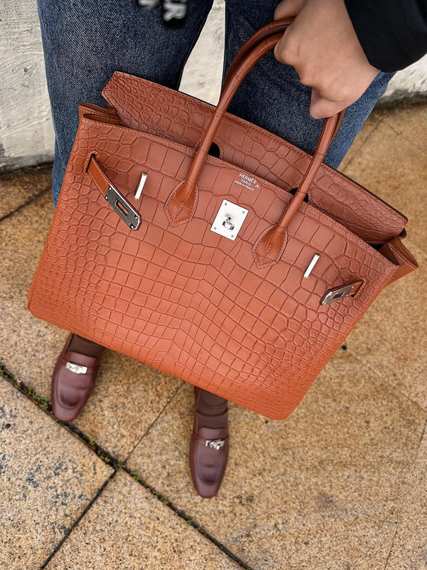 Close-up detail of understated bag design