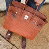 Close-up detail of understated bag design
