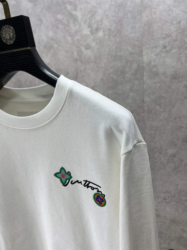 Full styled look of Louis Vuitton luxury clothing with logo-detail design