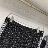 Back view of Louis Vuitton luxury clothing with everyday silhouette
