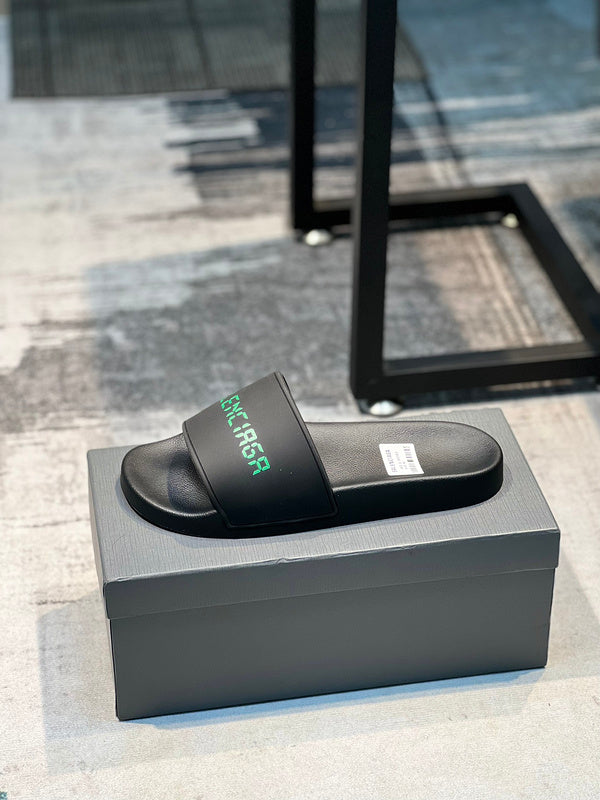 Balenciaga Black Flat Thong Sandals - Side Profile View