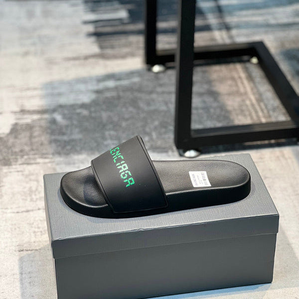 Balenciaga Black Flat Thong Sandals - Side Profile View