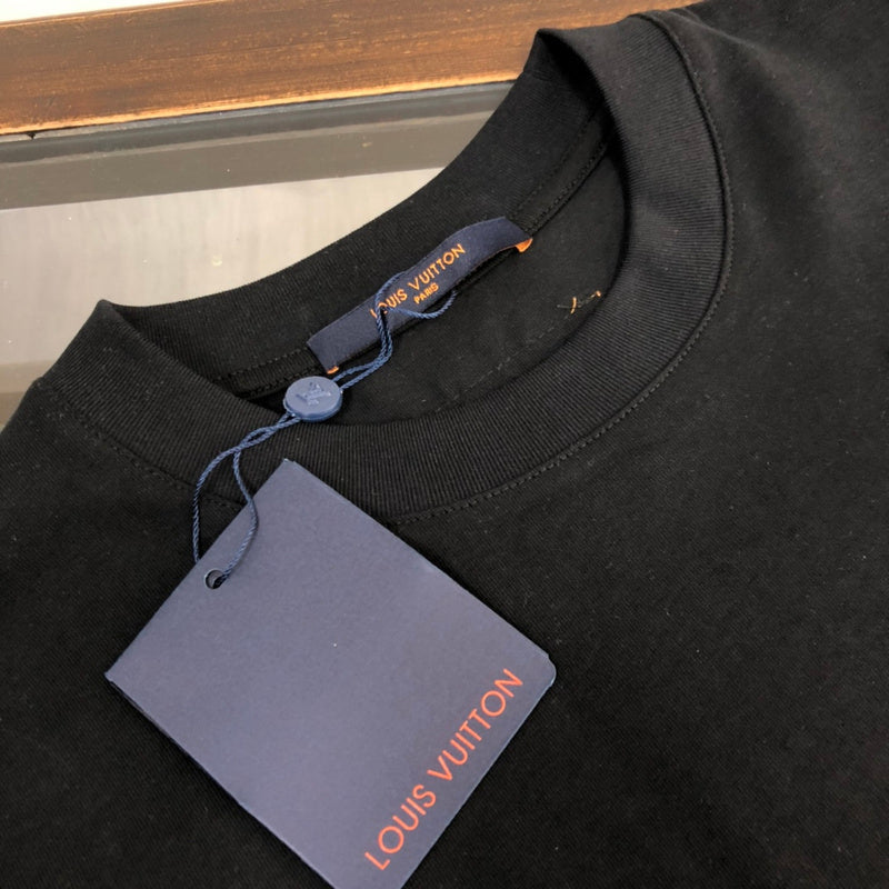Flat lay presentation of Louis Vuitton cotton t-shirt with streetwear-inspired cut