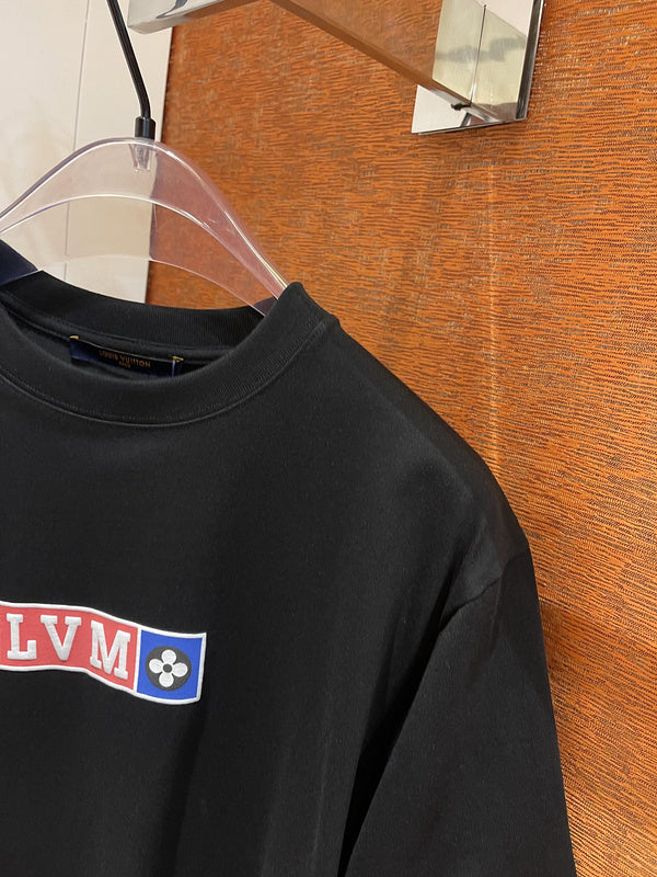 Flat lay presentation of Louis Vuitton cotton t-shirt with tailored silhouette