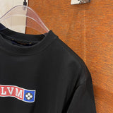 Flat lay presentation of Louis Vuitton cotton t-shirt with tailored silhouette