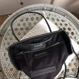 Side profile of modern chic women's handbag – women's luxury handbag