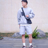  clean-lined carryall bag styled with outfit