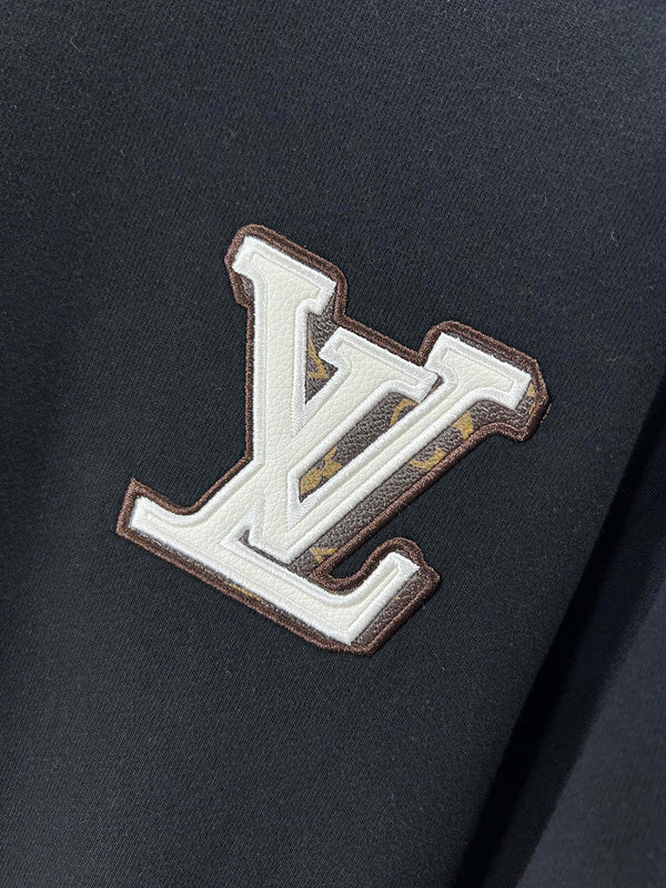 Front view of Louis Vuitton luxury clothing with logo-detail design