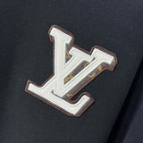 Front view of Louis Vuitton luxury clothing with logo-detail design