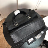 Back view of modern refined women's handbag – women's luxury handbag