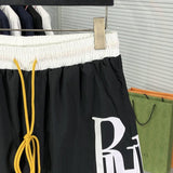 Full styled look of Rhude luxury clothing with label-forward styling