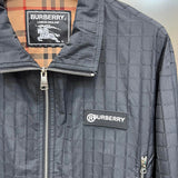 Burberry clothing close-up — premium authentic designer style