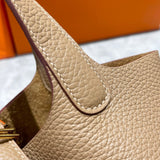Side view of streamlined structured handbag