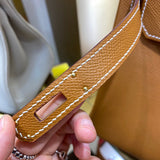 Side view of sleek structured handbag
