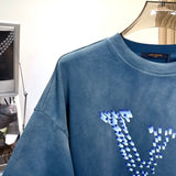 Front view of Louis Vuitton luxury clothing with everyday silhouette