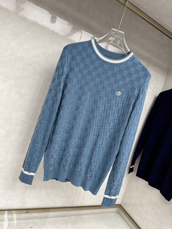 Side profile of Louis Vuitton luxury clothing with signature branding