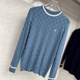 Side profile of Louis Vuitton luxury clothing with signature branding