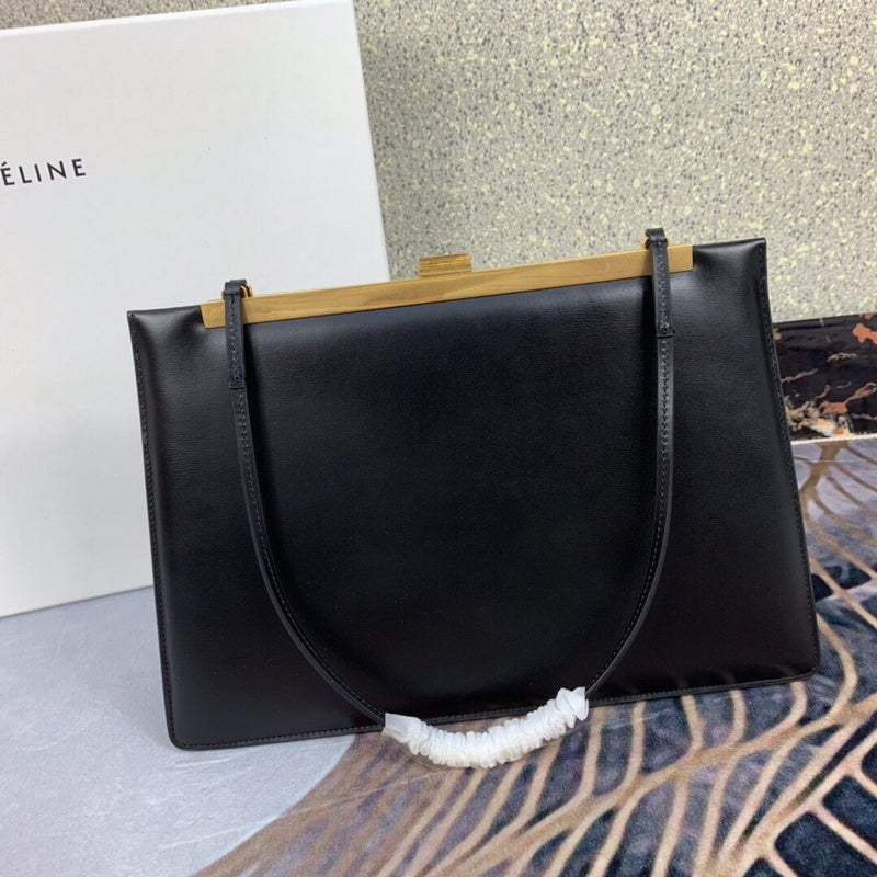 Styled lifestyle shot of sleek elevated women's handbag – women's statement bag