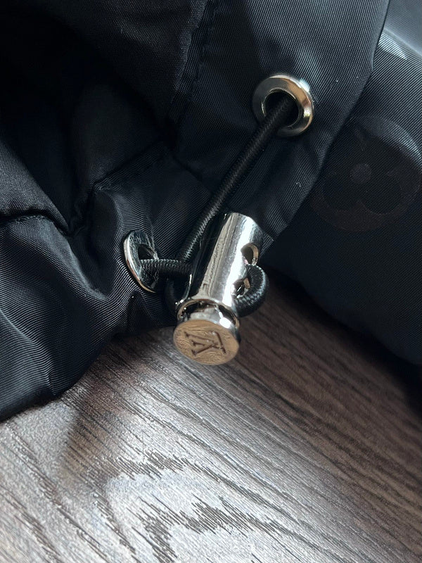 Back view of Louis Vuitton luxury clothing with logo-detail design