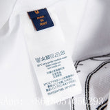 Back view of Louis Vuitton luxury clothing with label-forward styling